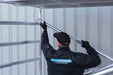 Rollgerüst Eurogerüst Original 75x305 9,2m Arbeitshöhe Carbonplattform gegen Fassade - GerüstExpress