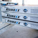 Gerüstanhänger 250cm offen inklusive Alumexx Budget Rollgerüst 135x250 8,2 m Arbeitshöhe - Gerüstexpress.de