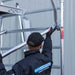 Rollgerüst Eurogerüst Original 90x250 9,2m Arbeitshöhe Carbonplattform gegen Fassade - Gerüstexpress.de